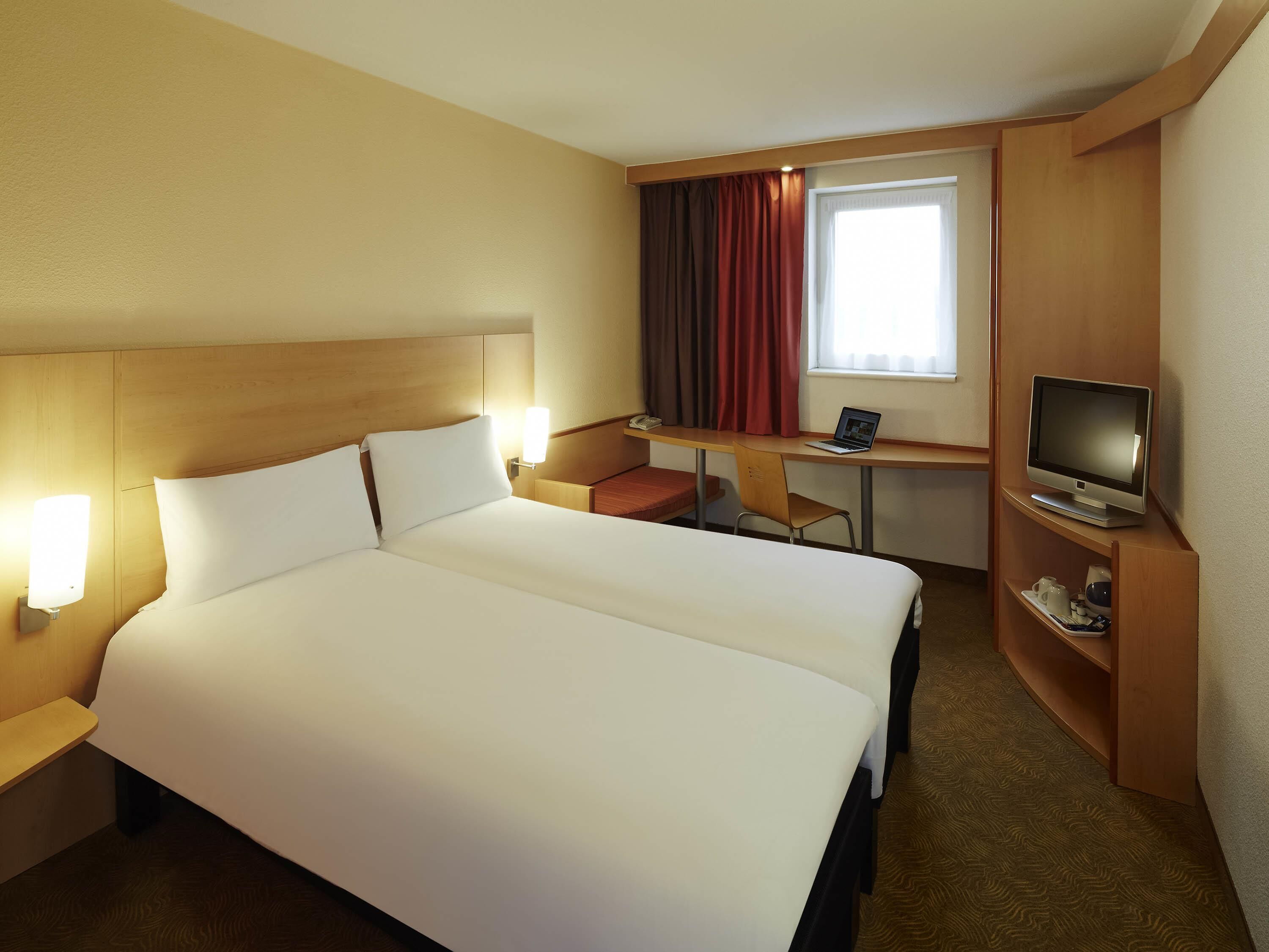 Hypo-allergenic bedding, desk, blackout drapes, soundproofing