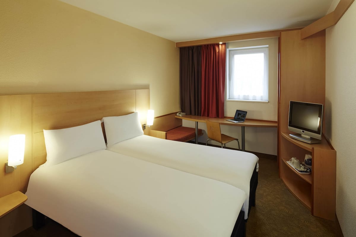 Hypo-allergenic bedding, desk, blackout drapes, soundproofing