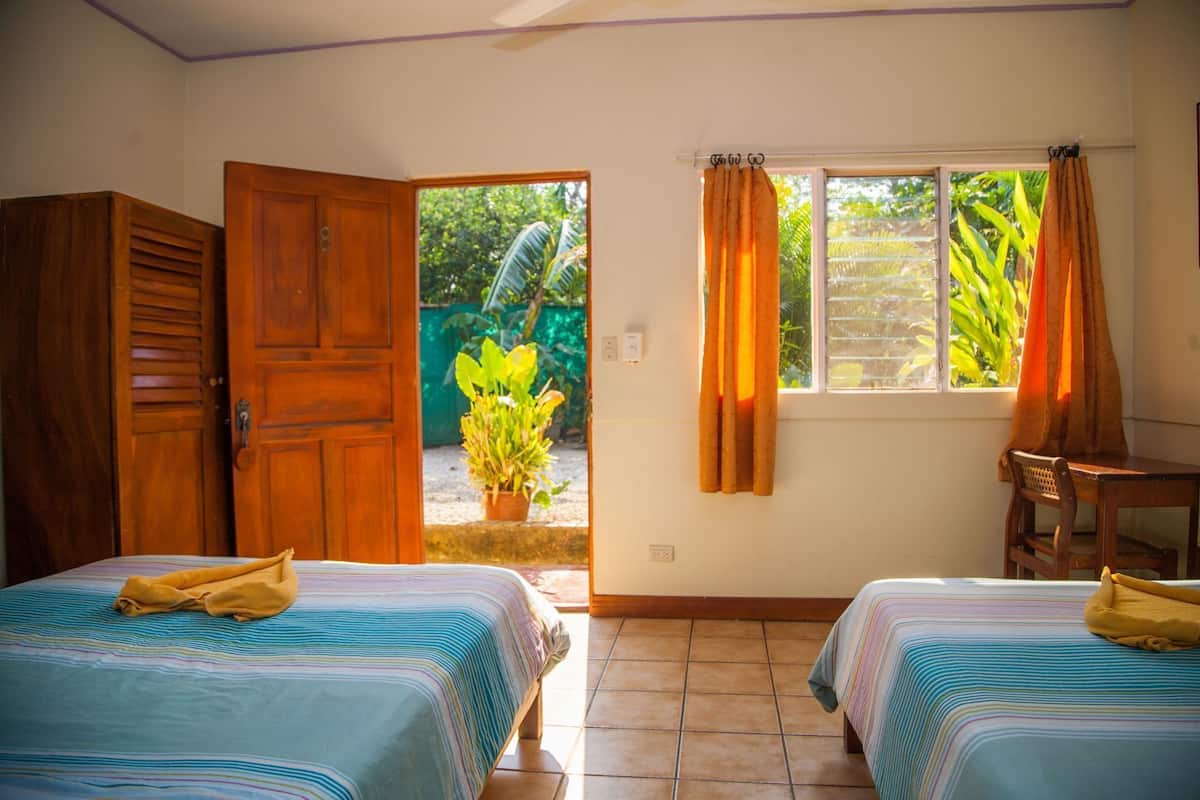 Desk, laptop workspace, free WiFi, bed sheets