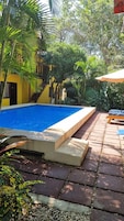 Outdoor pool, open 8:00 AM to 9:00 PM, free cabanas