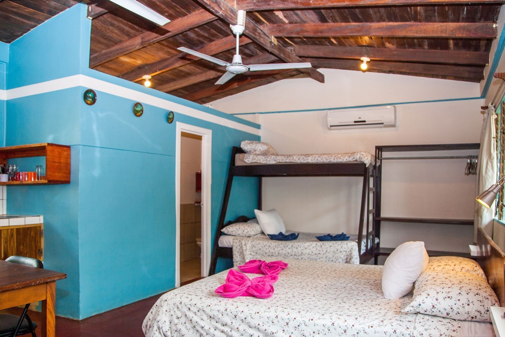 Desk, laptop workspace, free WiFi, bed sheets