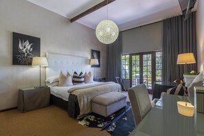 Habitación doble de lujo | Sala de estar | Televisión 