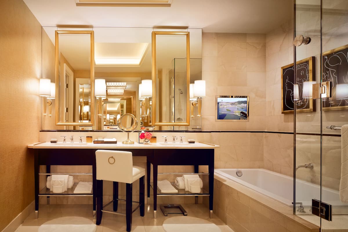 encore deluxe suite | bathroom | separate bathtub and shower, deep-soaking bathtub, rainfall showerhead