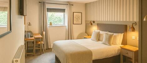 Individually decorated, individually furnished, desk, laptop workspace