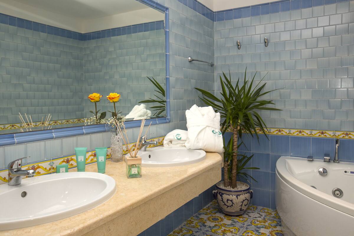 suite | bathroom | free toiletries, hair dryer, slippers, bidet