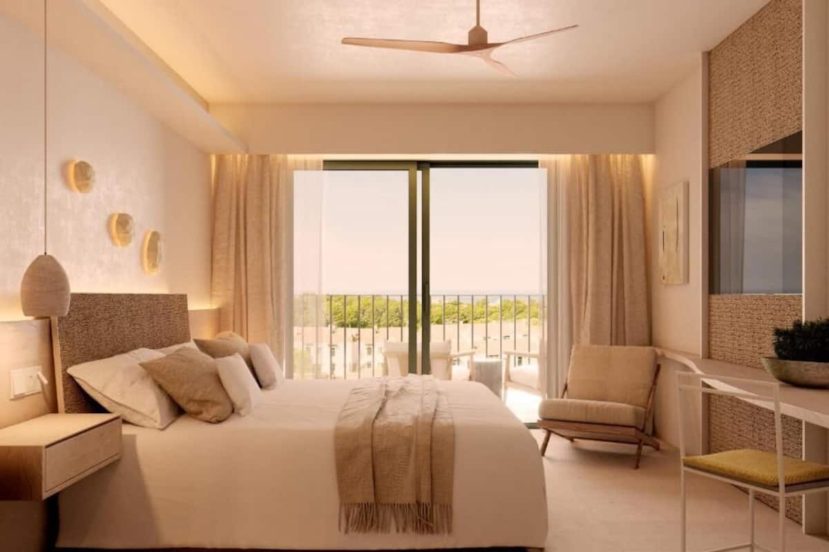 Roupas de cama premium, frigobar, cofres nos quartos
