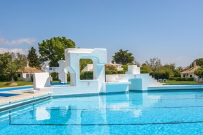 Outdoor pool, pool umbrellas, sun loungers