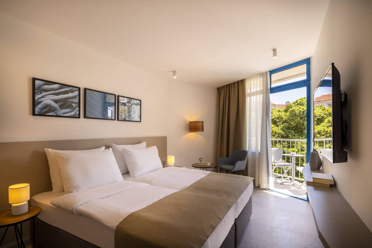 Standard Twin Room, Balcony, Sea Facing | In-room safe, blackout drapes, bed sheets