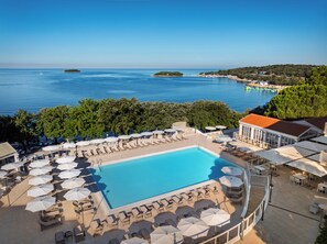 Seasonal outdoor pool, pool umbrellas