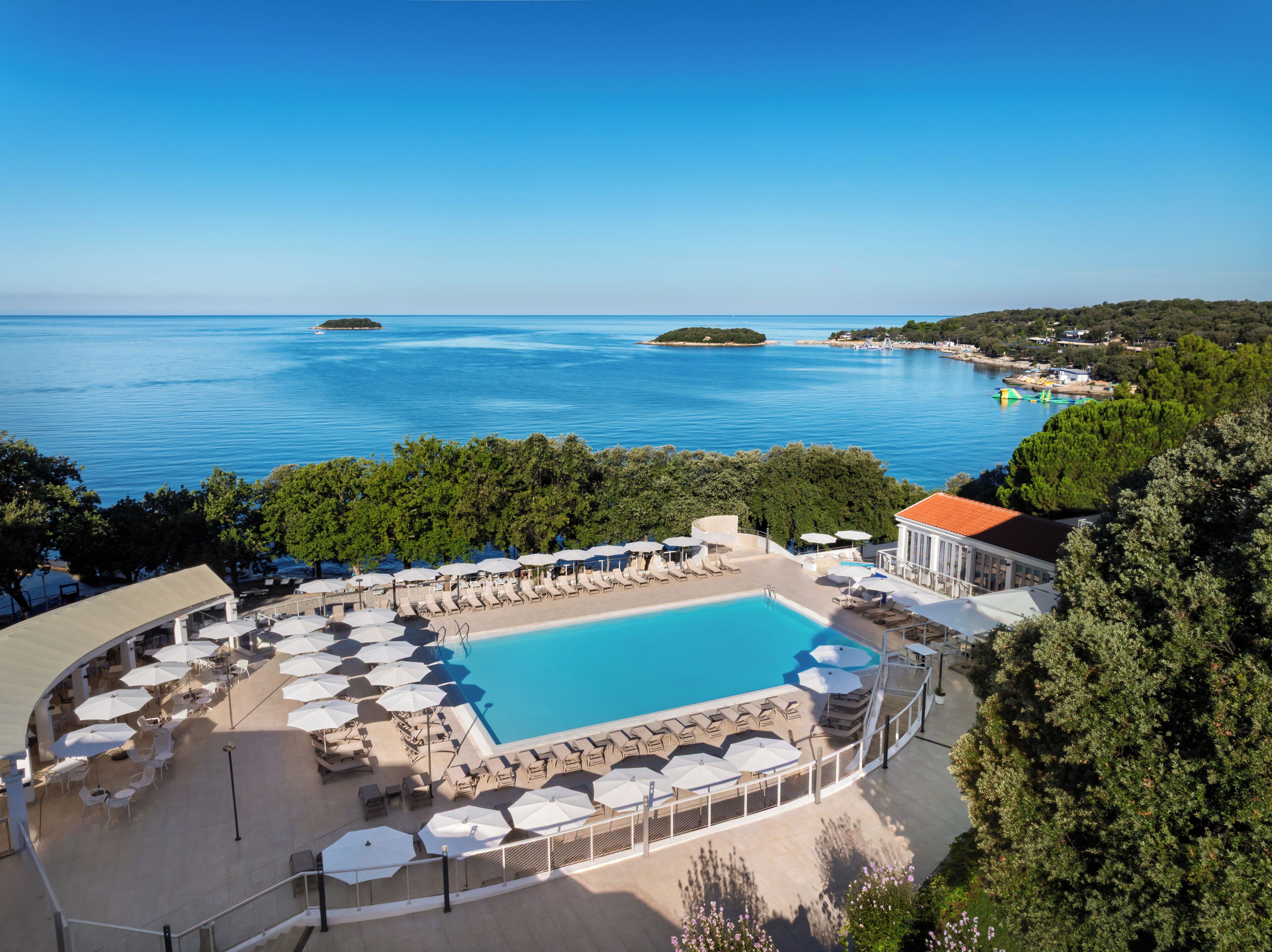 Seasonal outdoor pool, pool umbrellas