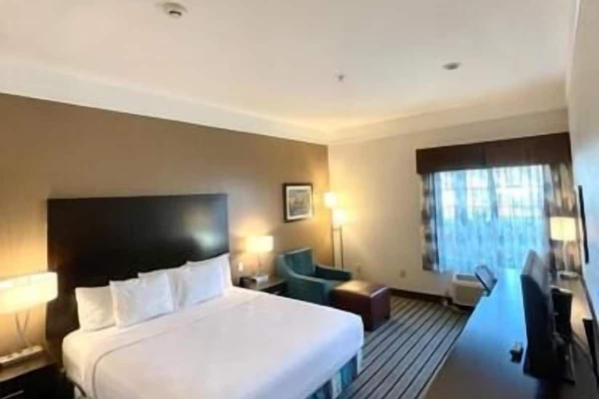 Premium bedding, desk, blackout drapes, iron/ironing board