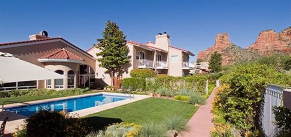 Seasonal outdoor pool, pool umbrellas, pool loungers