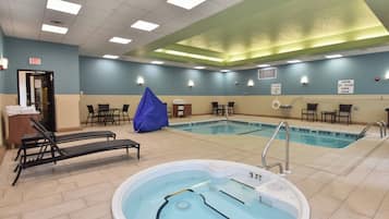 Indoor pool, open 6 AM to 10 PM, pool loungers