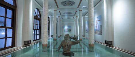 Indoor pool, outdoor pool, pool umbrellas