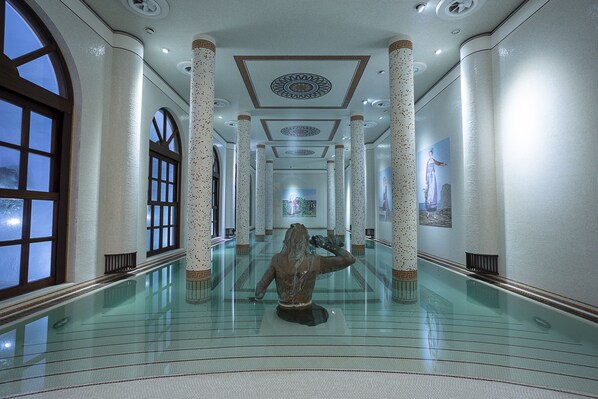 Indoor pool, outdoor pool, pool umbrellas