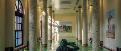 Indoor pool, outdoor pool, pool umbrellas