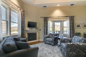 Suite, 1 King Bed (Hargadine) | Living room | Flat-screen TV