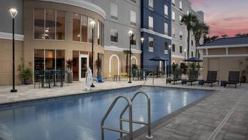 Outdoor pool, open 9:00 AM to 10:00 PM, pool loungers