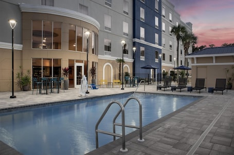 Outdoor pool, open 9:00 AM to 10:00 PM, pool loungers. Hampton Inn & Suites Lake City