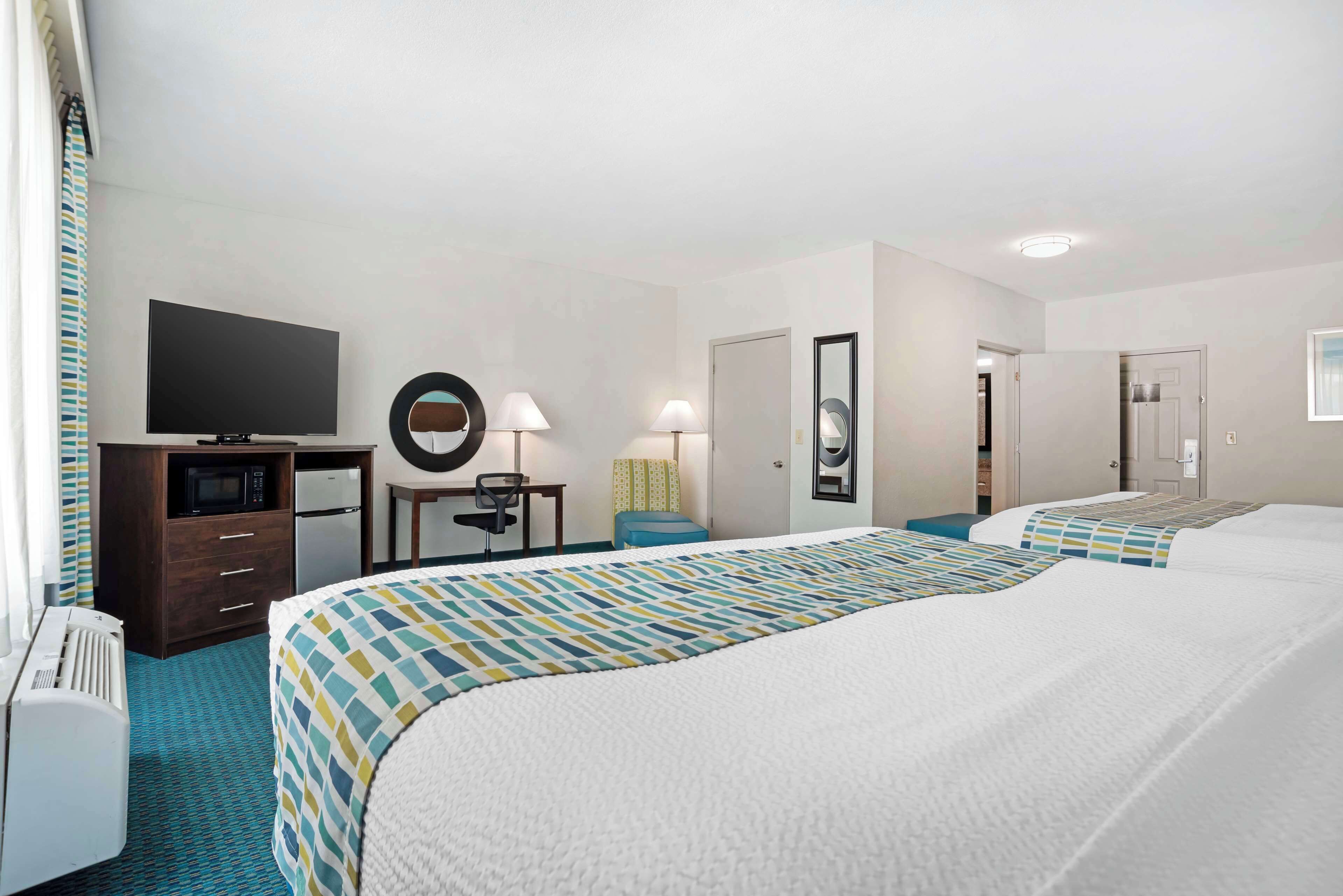 standard room, multiple beds, non smoking, refrigerator & microwave (larger room;with sofabed) | desk, laptop workspace, blackout curtains, iron/ironing board