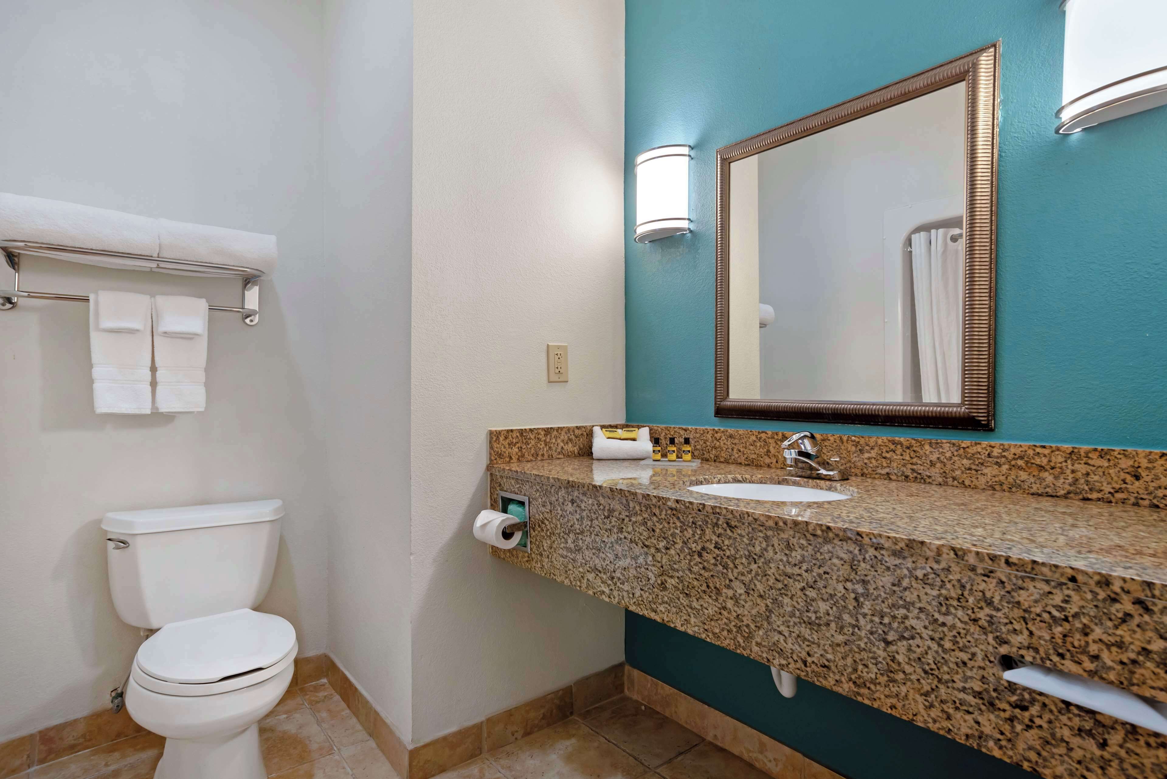 suite, 2 queen beds, non smoking, refrigerator & microwave | bathroom | free toiletries, hair dryer, towels