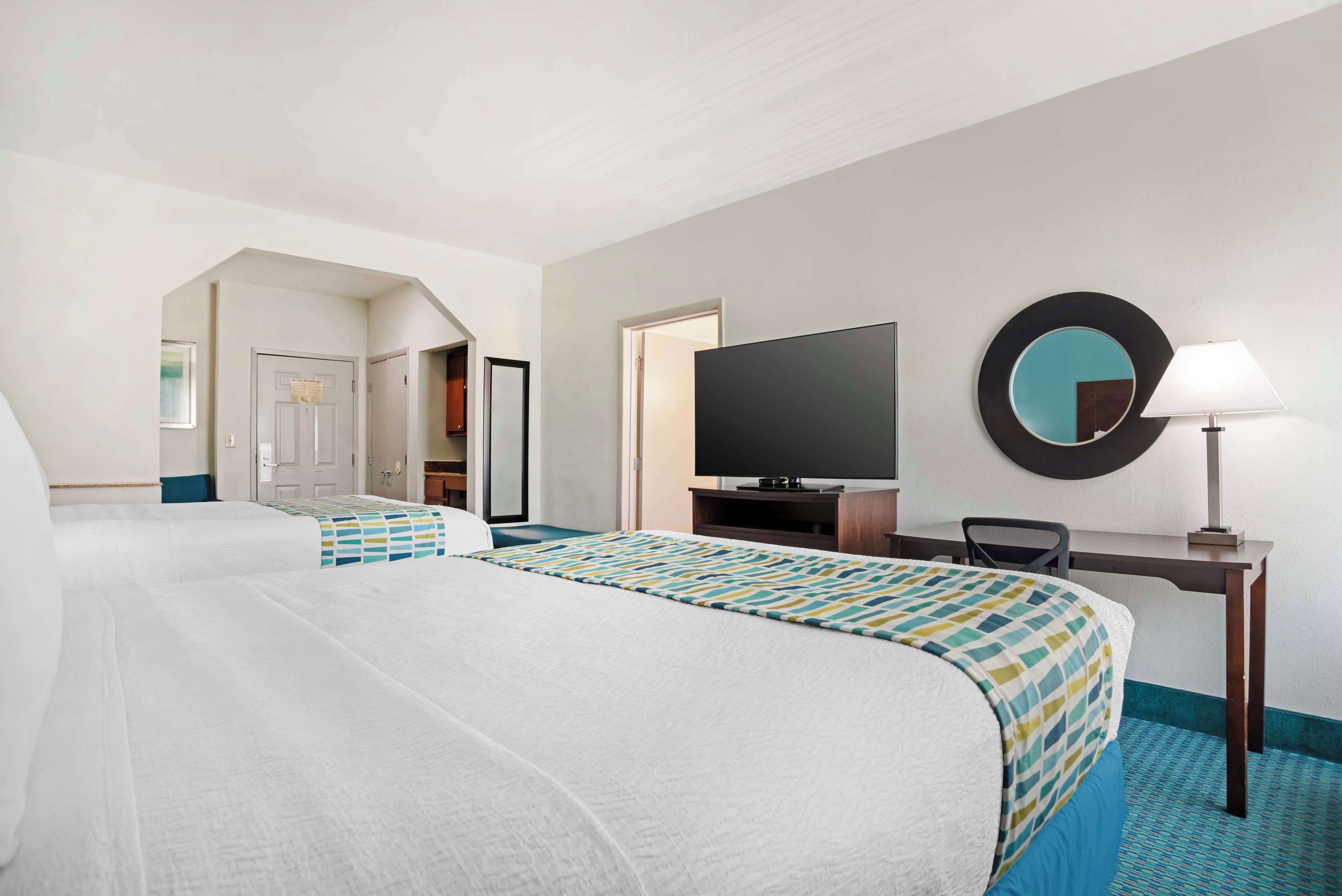 suite, 2 queen beds, non smoking, refrigerator & microwave | desk, laptop workspace, blackout curtains, iron/ironing board