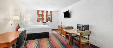 Rideaux occultants, fer et planche à repasser, lits bébé (en supplément)