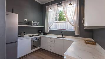 Apartment No 2 | Private kitchen | Microwave, stovetop, coffee/tea maker, electric kettle