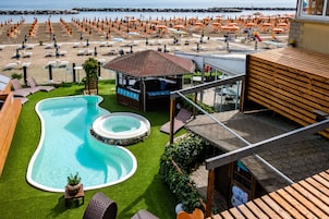 Seasonal outdoor pool, open 8:00 AM to 7:00 PM, sun loungers