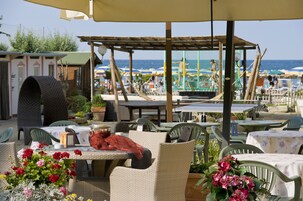 Breakfast, lunch served; Italian cuisine, beach views 