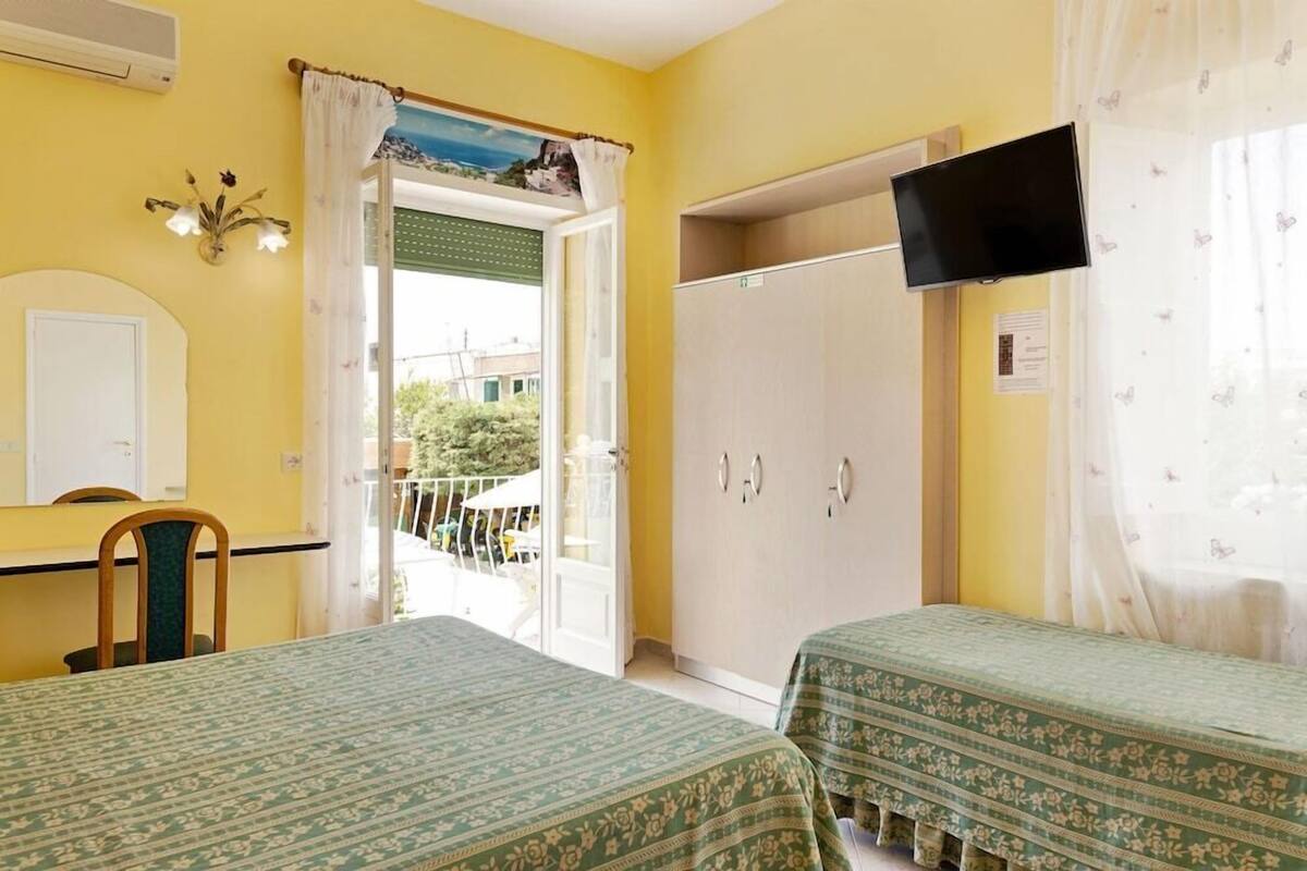 Standard Triple Room | Premium bedding, in-room safe, desk, blackout drapes