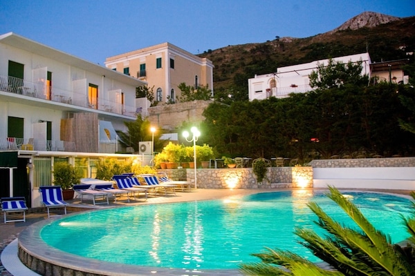 Seasonal outdoor pool, pool umbrellas, sun loungers