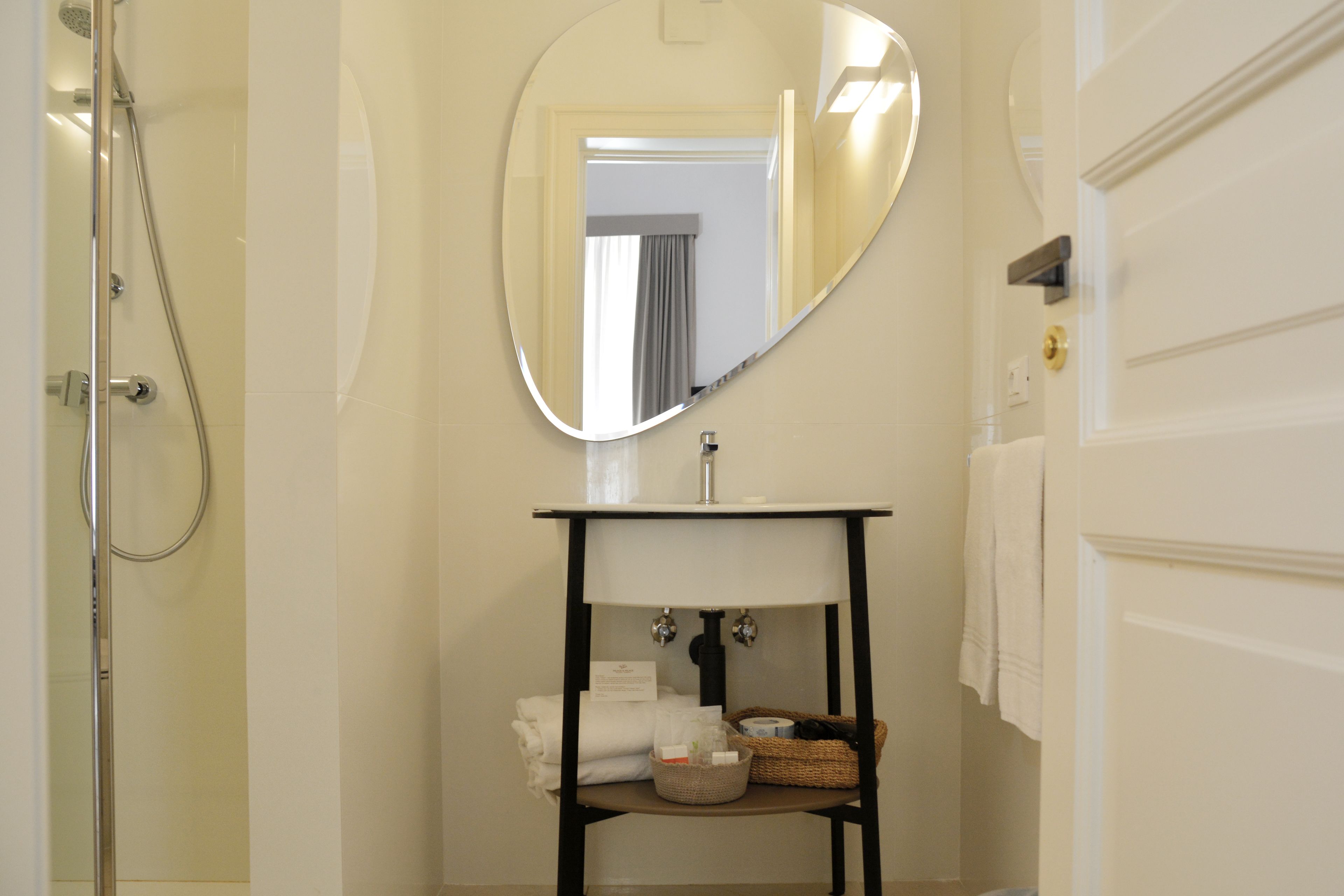 premium room | bathroom | shower, free toiletries, hair dryer, slippers