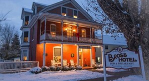 A two-story building with a sign for the Bross Hotel, indicating it offers bed and breakfast services. - Bross Hotel (Paonia)