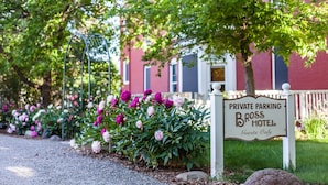 A sign for private parking at the Bross Hotel, indicating guest-only access. - Bross Hotel (Paonia)