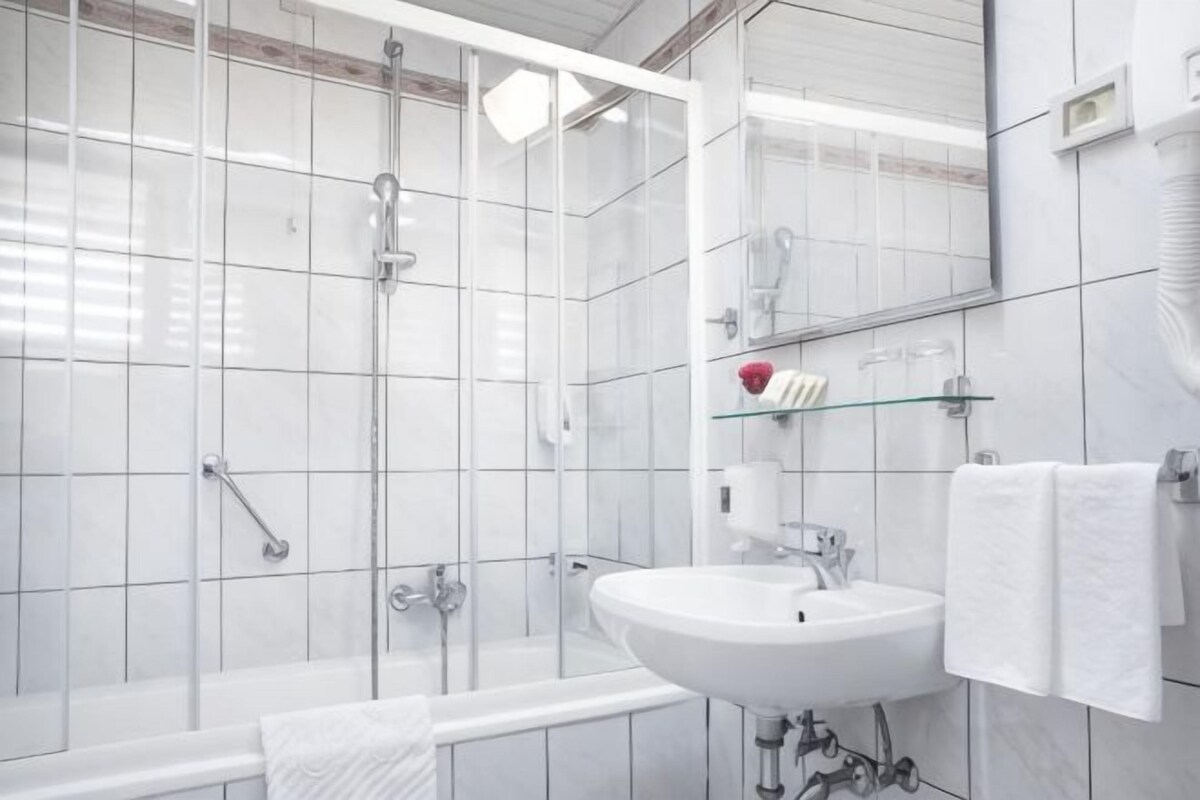 Bathroom | Bathtub, free toiletries, hair dryer, towels