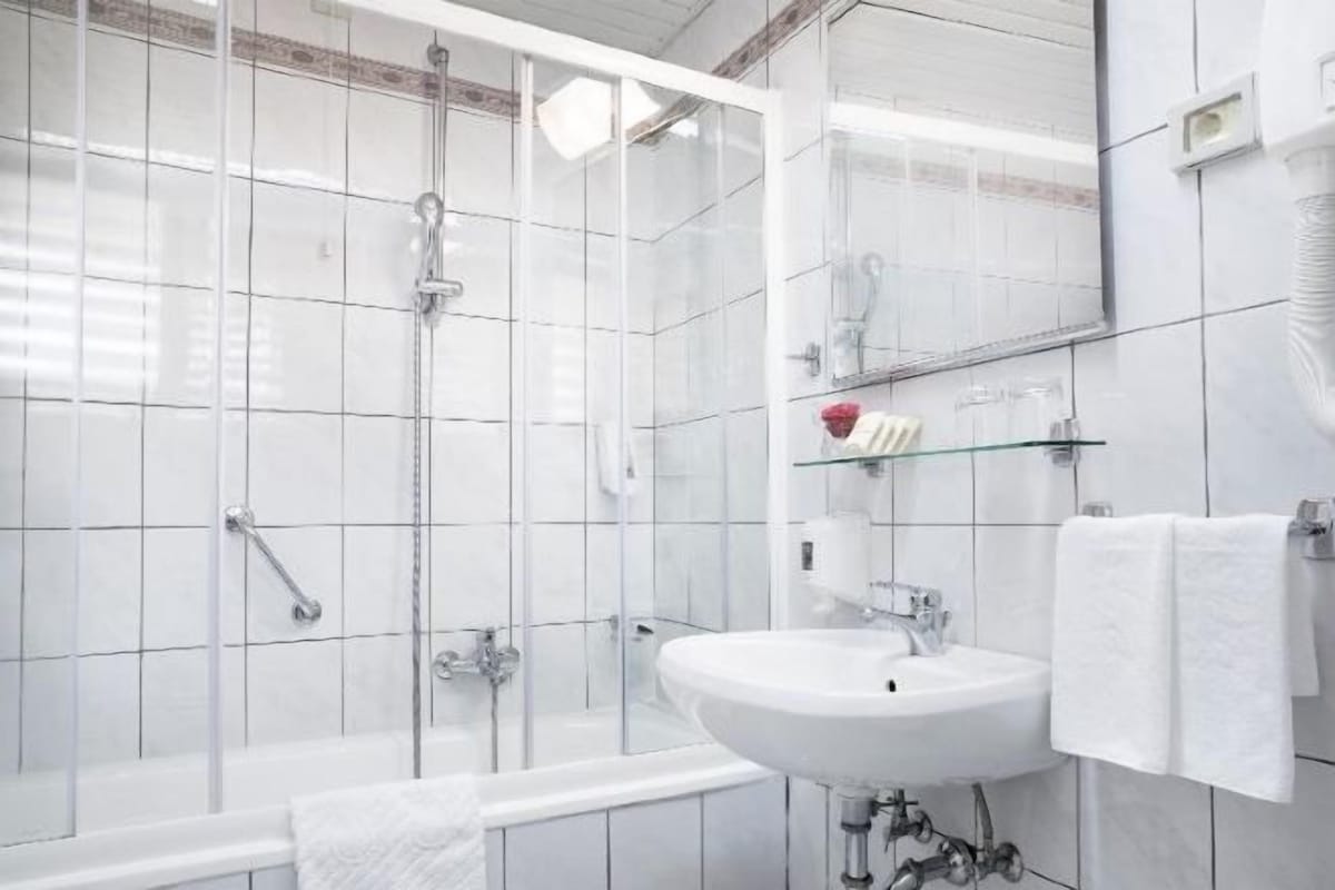 Bathroom | Bathtub, free toiletries, hair dryer, towels
