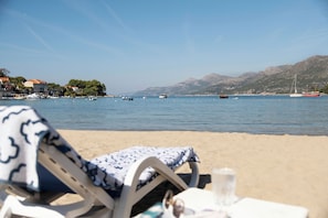 Am Strand, Sporttauchen, Volleyball, Rudern/Kanufahren