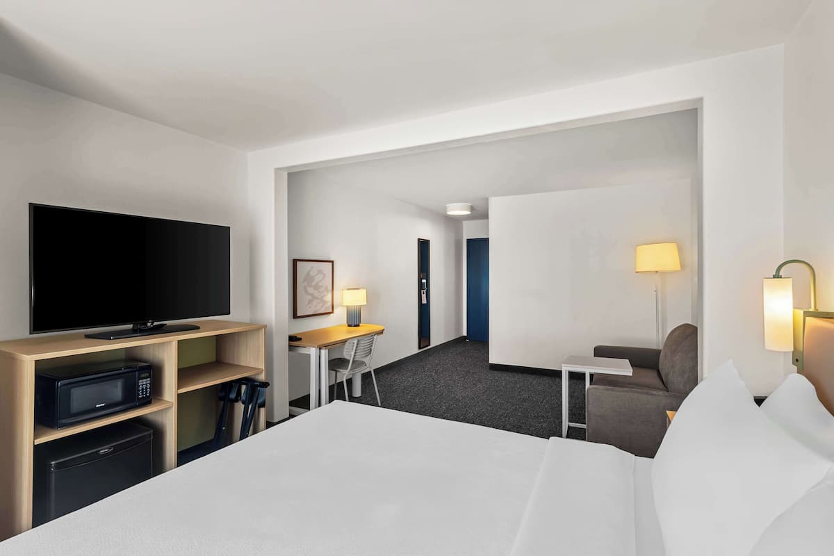 Down comforters, pillowtop beds, in-room safe, desk