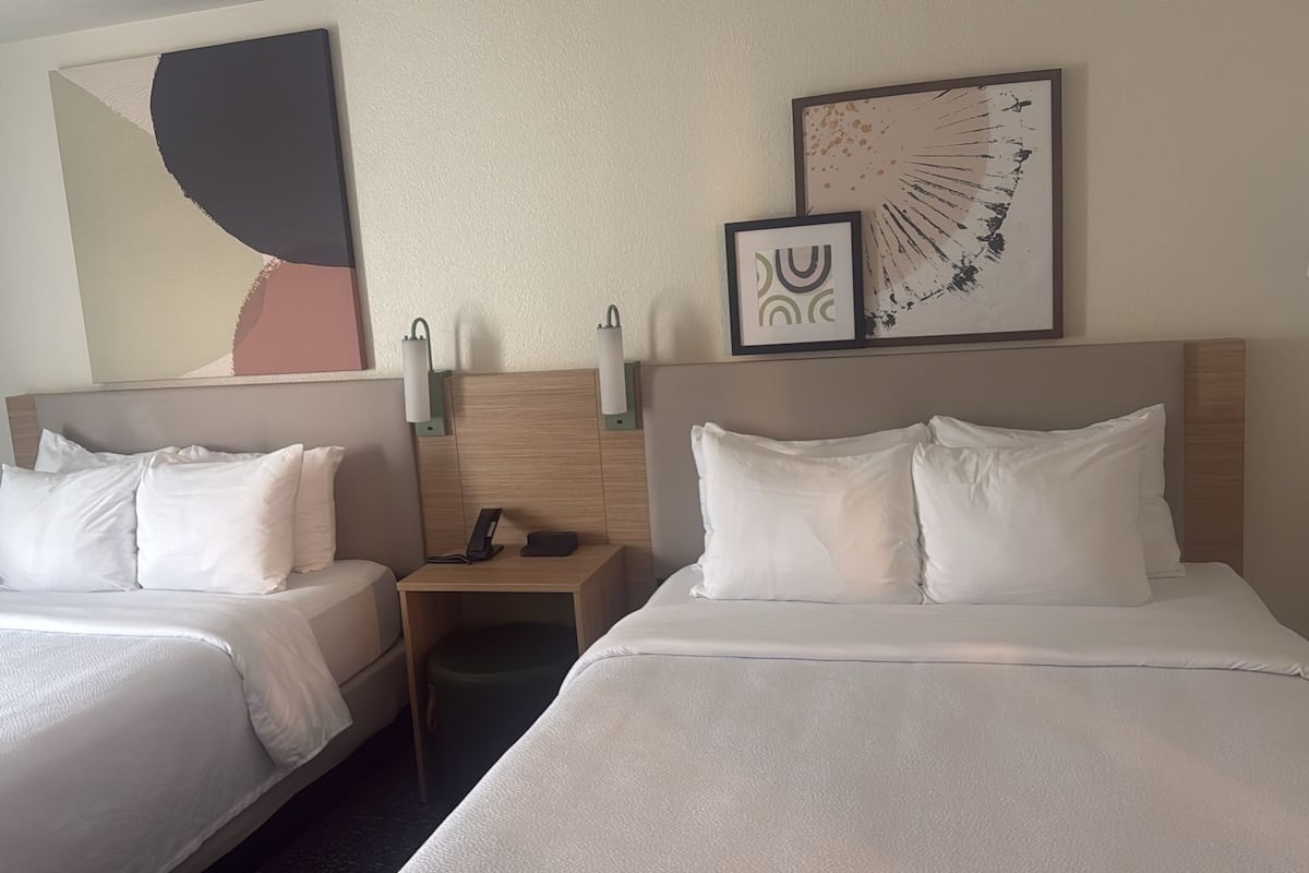 down duvets, pillow-top beds, in-room safe, desk