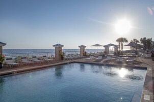 Outdoor pool, pool umbrellas, sun loungers