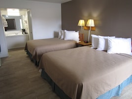 Tabla de planchar con plancha, wifi gratis, ropa de cama