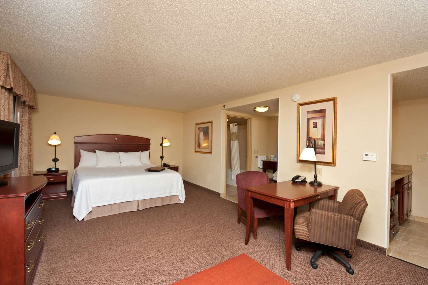 Down comforters, desk, laptop workspace, blackout drapes