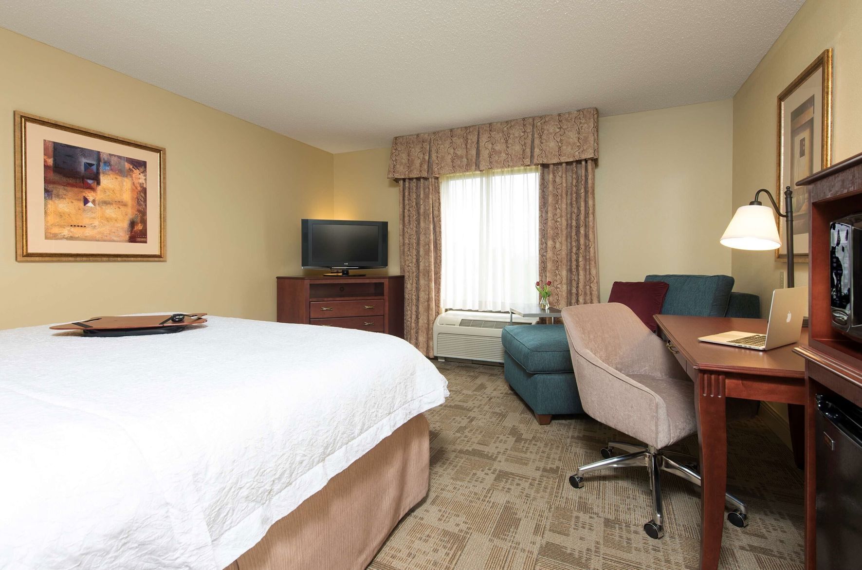 Down comforters, desk, laptop workspace, blackout drapes