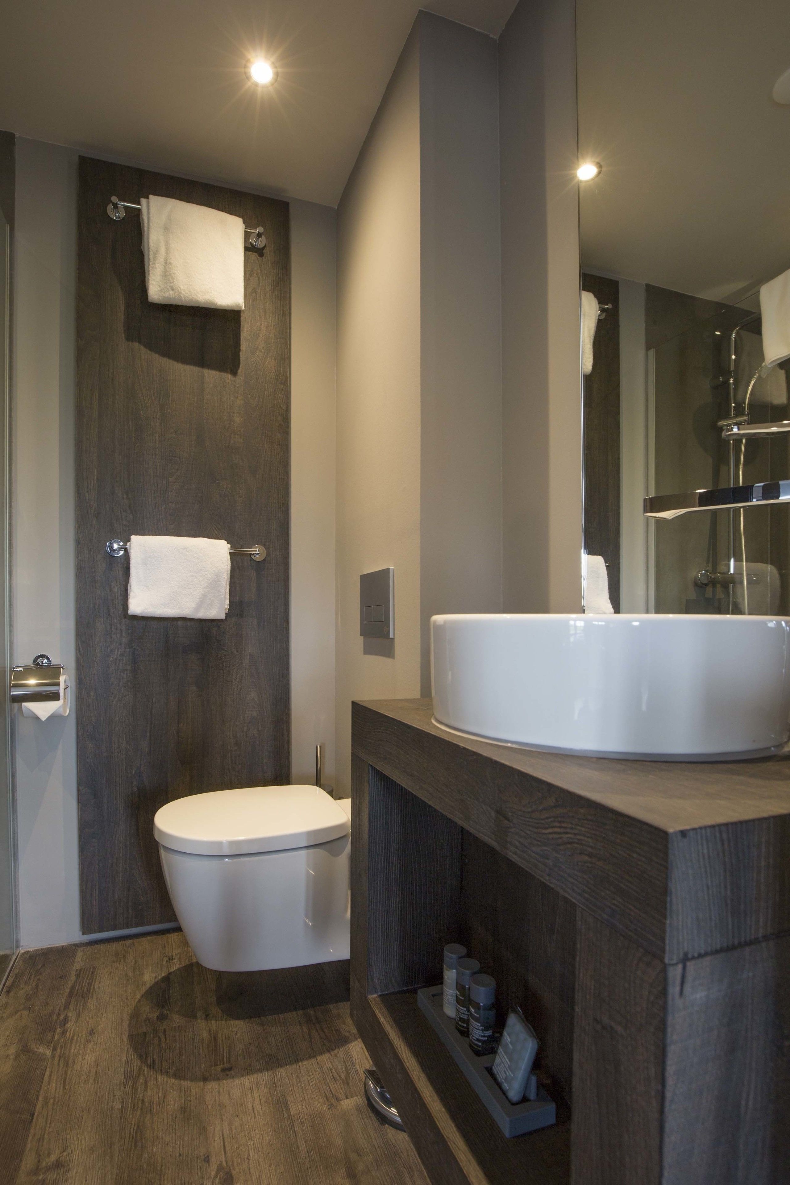 shower, eco-friendly toiletries, hair dryer, towels