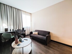 Junior Suite | Living area | LCD TV