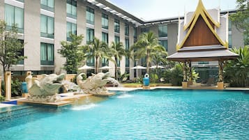 Outdoor pool, open 6:00 AM to 10:00 PM, pool umbrellas, sun loungers