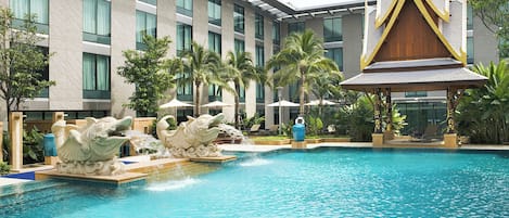 Outdoor pool, open 6:00 AM to 10:00 PM, pool umbrellas, sun loungers