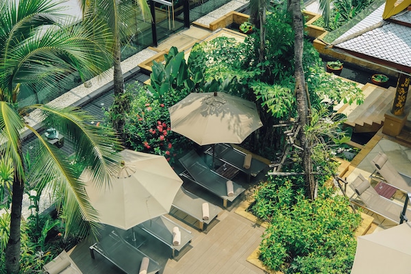 Outdoor pool, open 6:00 AM to 10:00 PM, pool umbrellas, sun loungers