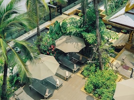 Outdoor pool, open 6:00 AM to 10:00 PM, pool umbrellas, sun loungers